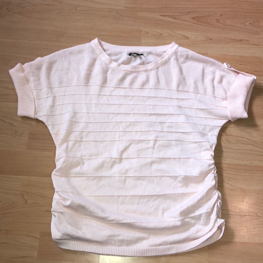 Super cute scrunched on the hip pink ish blouse